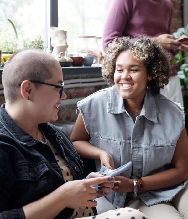 two-happy-young-businesswomen-in-smart-casualwear-2025-03-14-21-52-51-utc (1)
